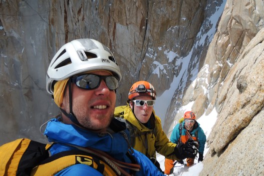 Domen, Tim and Sam already high up on the ledges exiting the couloir