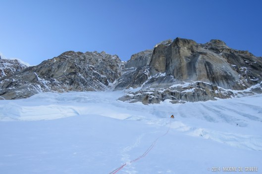 Sam crossing the shrund. Mini moonflower north couloir is the 