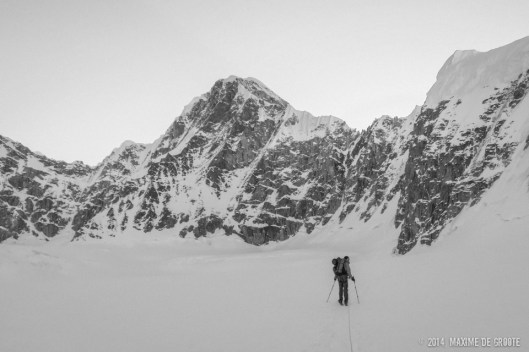 Sam approaching Kahiltna Queen, The west face couloir is the obvious snow line starting in the middle of the face and leading up to the righthand ridge