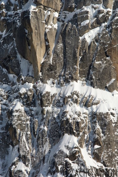 Maxime on the belay in the snow while Sam is leading the prow, picture by Zach Clanton