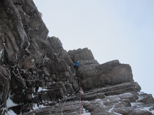Dave has just overcome a small roof and has come to the crux of the route, a delicate traverse. Denis (c)